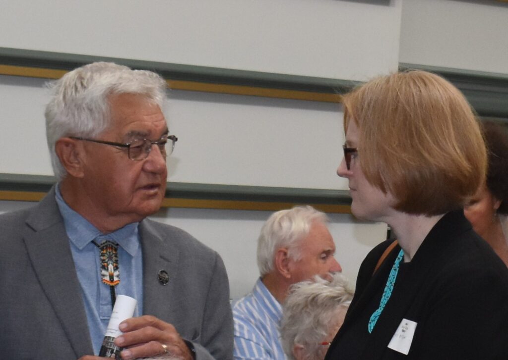 Left: Chief Knott of Curve Lake First nation having a conversation with Consul General Janice McGann on the right. 